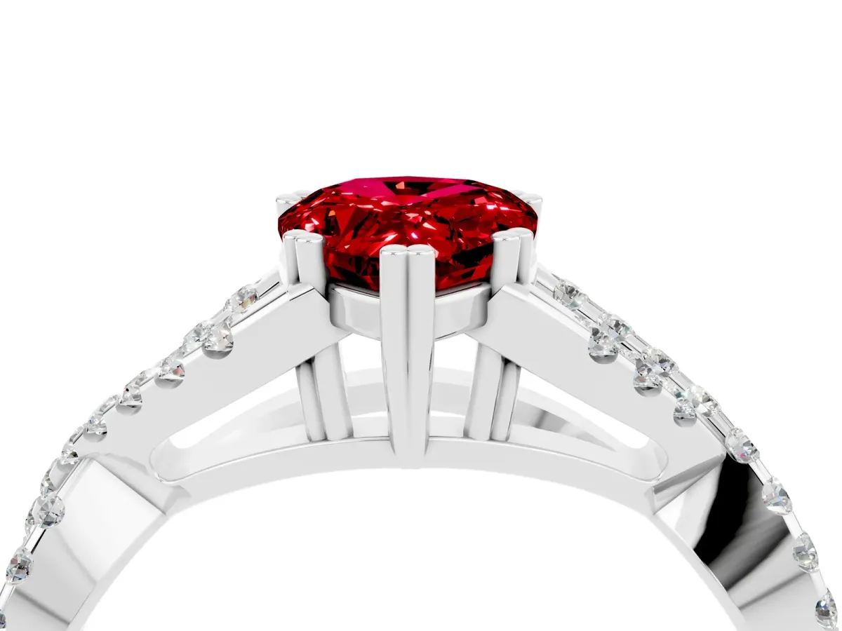 Pear Cut Ruby Solitaire Ring with Four-Prong Setting and Twisted Pavé Band Platinum