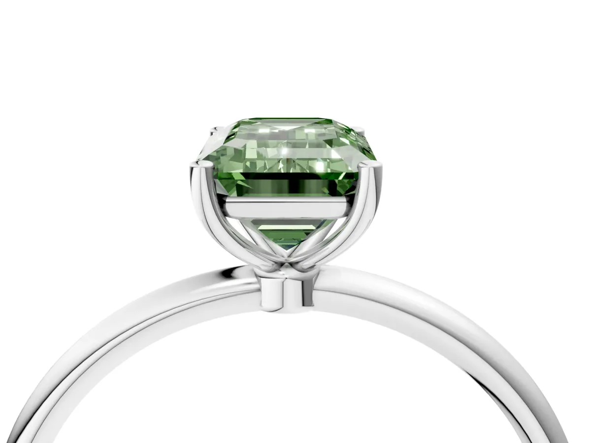Fancy Green Emerald Cut Cut Solitaire Engagement Ring with Thin Band and Four-Prong Setting Silver