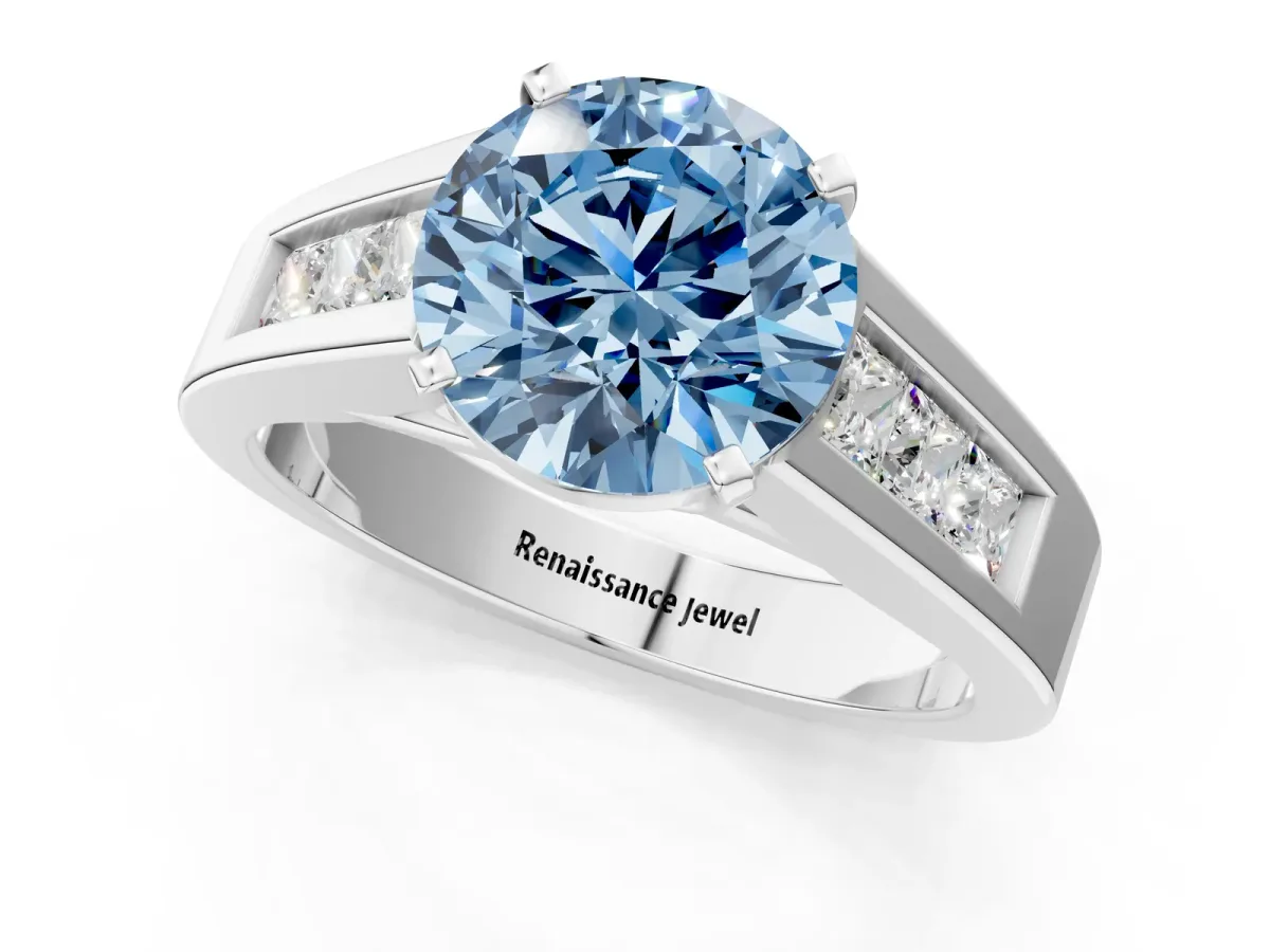 Fancy Blue Round Cut Cut Channel Set Solitaire Ring with Four-Prong Setting Silver