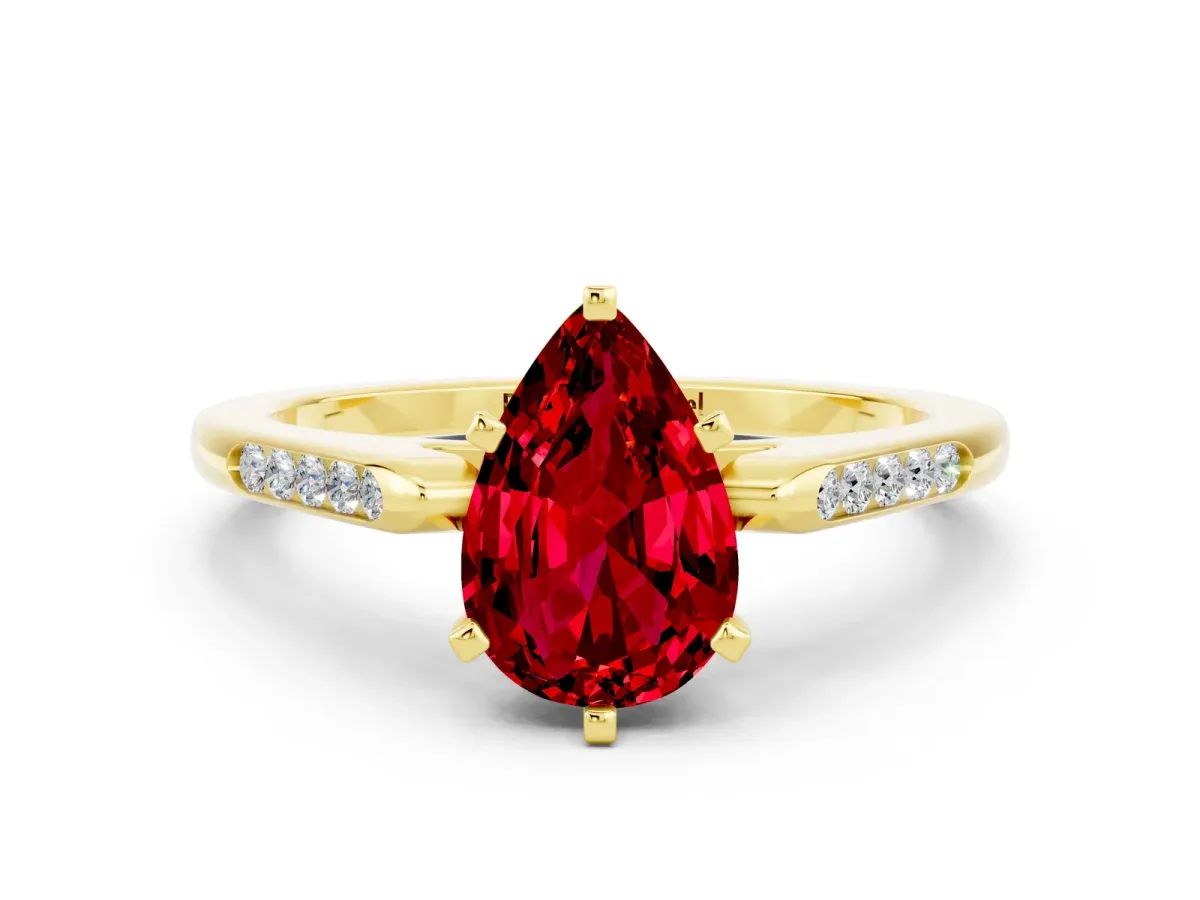 Pear Cut Ruby Solitaire Ring with Channel Set Round Band and Prong Setting Yellow gold
