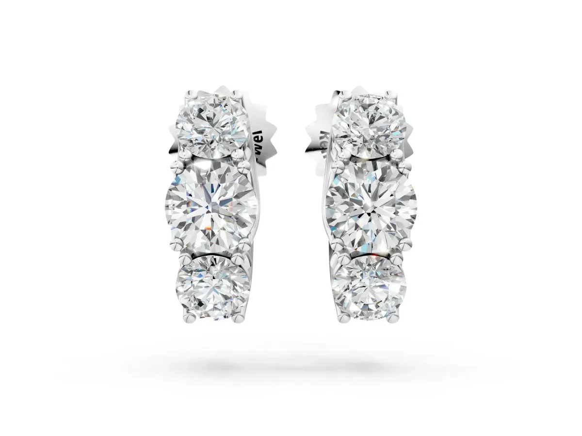 Round Diamond Prong Set Three-Stone White Gold Earrings Silver
