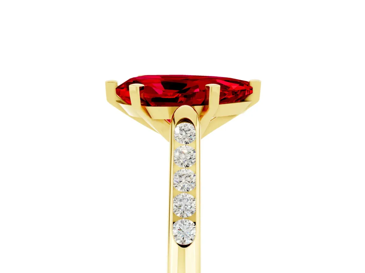 Pear Cut Ruby Solitaire Ring with Channel Set Round Band and Prong Setting Yellow gold