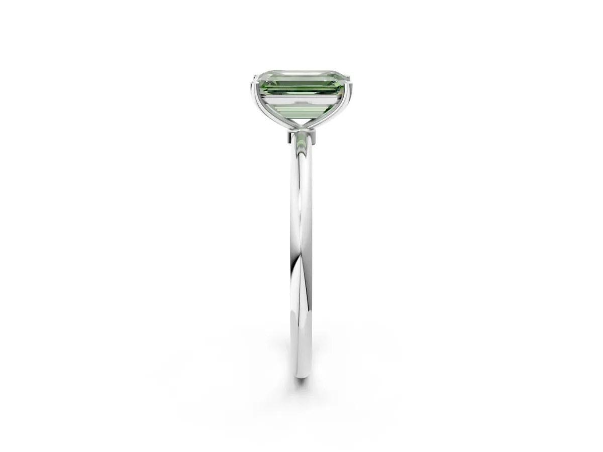 Fancy Green Emerald Cut Cut Solitaire Engagement Ring with Thin Band and Four-Prong Setting Silver