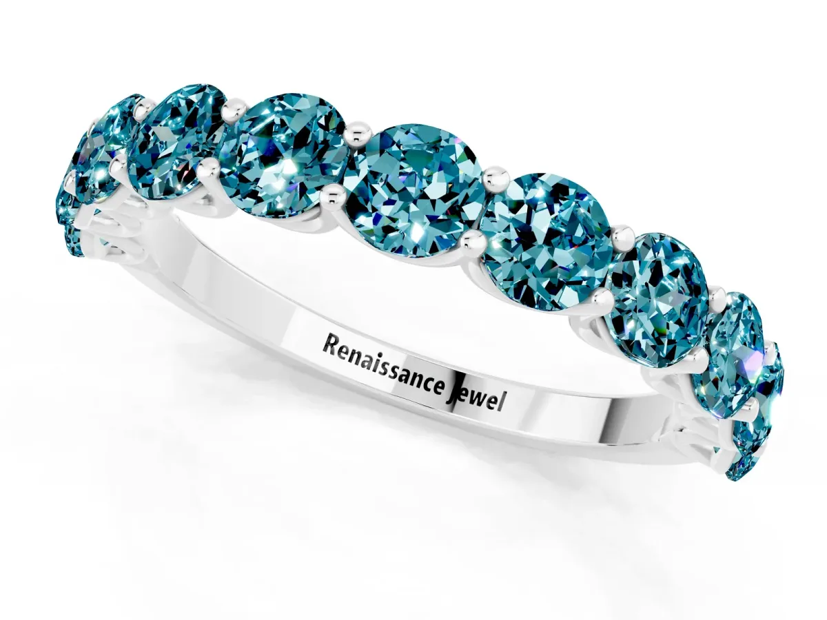 Round Blue Topaz Shared Prong Eternity Band Silver