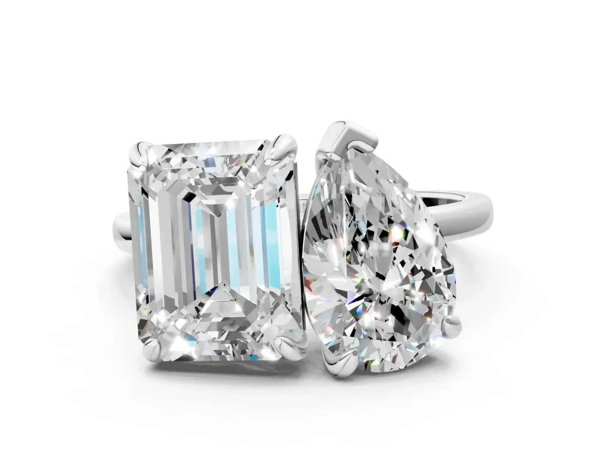 Pear and Emerald Toi Moi Ring with Prong Setting and Plain Band Silver