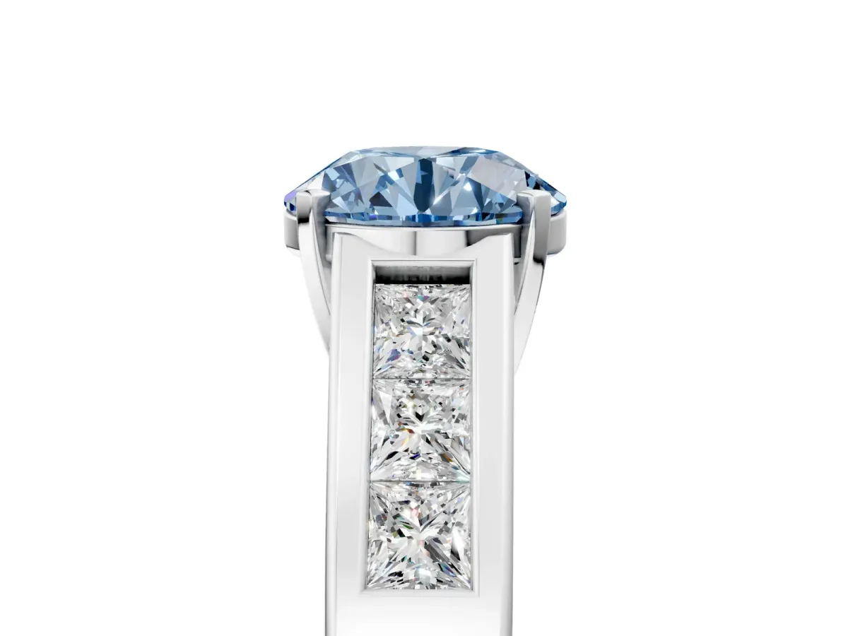 Fancy Blue Round Cut Cut Channel Set Solitaire Ring with Four-Prong Setting Silver