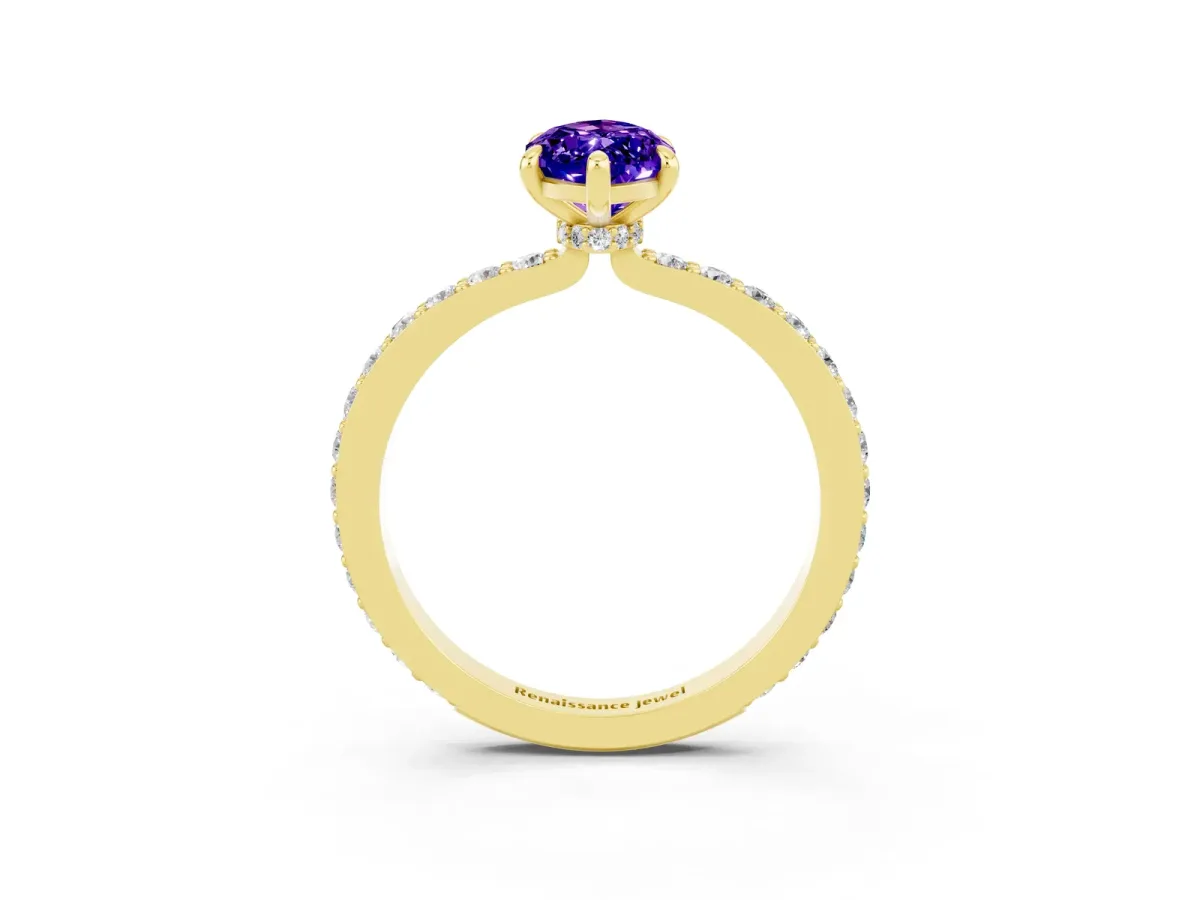 Marquise Cut Tanzanite Solitaire Engagement Ring with Pavé Band and Four-Prong Setting Yellow gold