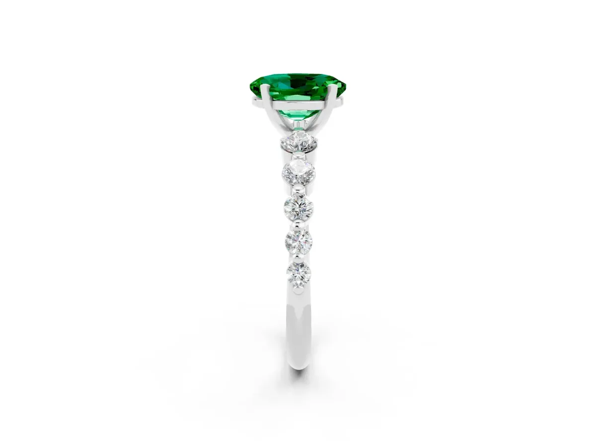 Oval Cut Solitaire Emerald Ring with Pave Band and Four-Prong Setting Platinum