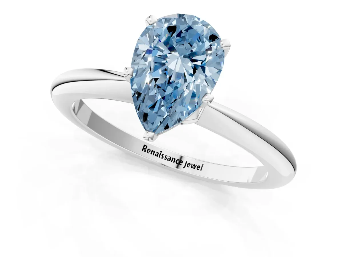 Fancy Blue Pear Cut Diamond Solitaire Ring with Six-Prong Setting and Classic Band Silver