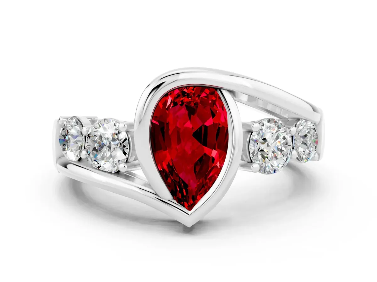 Bezel Set Pear Cut Ruby Bypass Ring with Round Accents Platinum