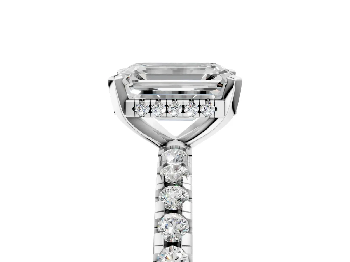 Emerald Cut Diamond Solitaire Ring with Round Pavé Band and Four-Prong Setting Silver