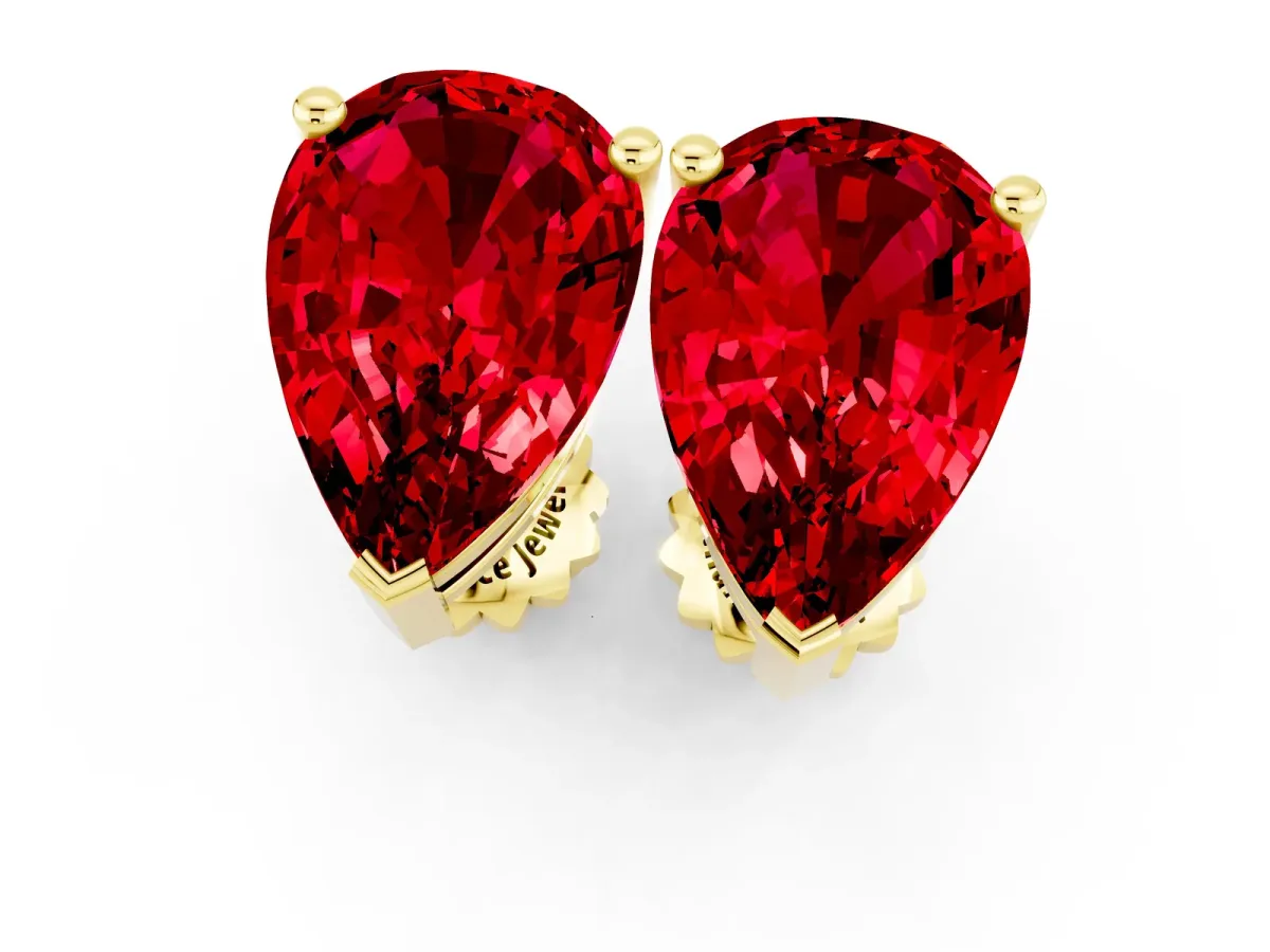 Pear Cut Ruby Stud Earrings Yellow gold