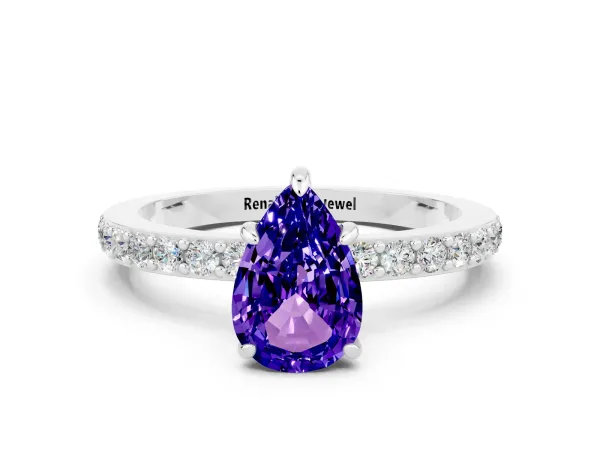 Pear Cut Tanzanite Solitaire Engagement Ring with Pavé Band and Four-Prong Setting Platinum
