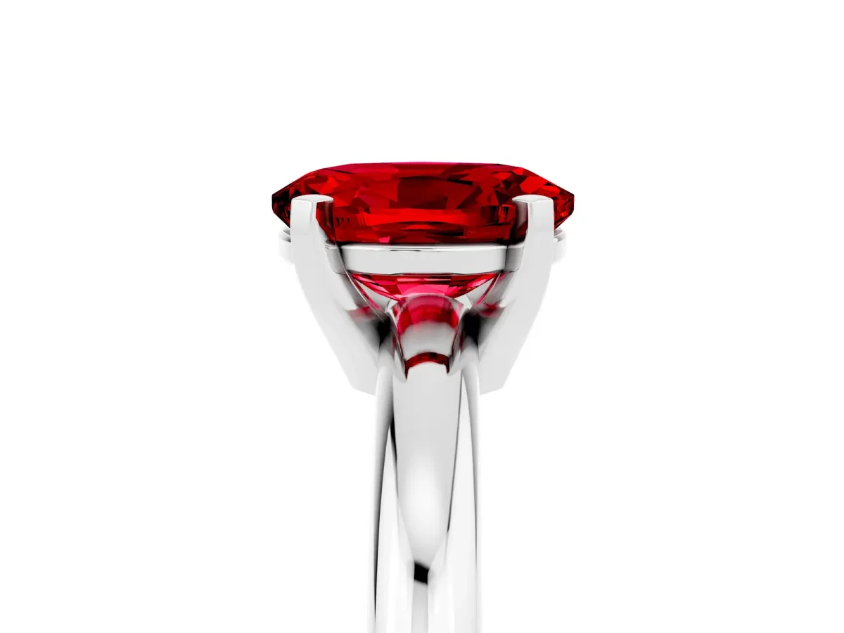 Oval Cut Ruby Solitaire Engagement Ring with Round Band and Four-Prong Setting Platinum