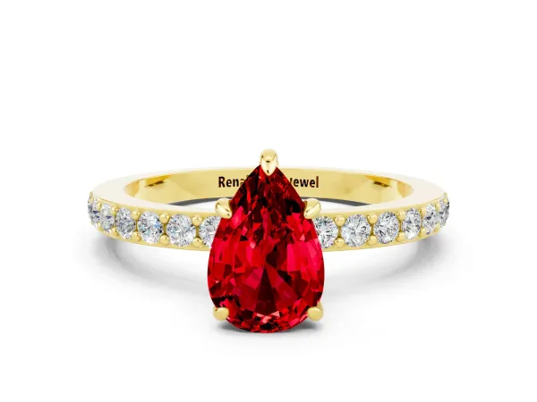 Pear Cut Ruby Solitaire Engagement Ring with Pavé Band and Four-Prong Setting Yellow gold