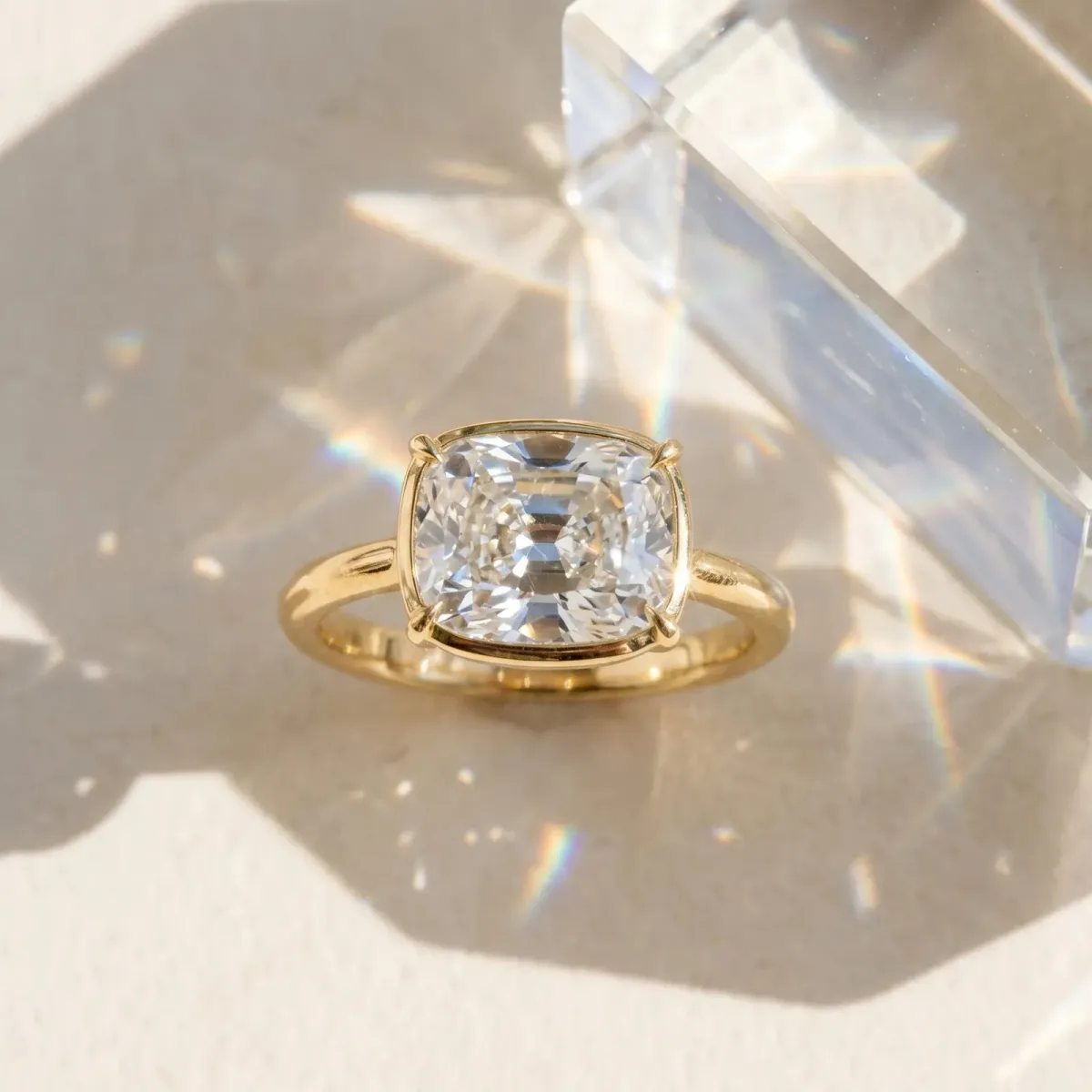 Old Mine Elongated Cushion Diamond East-West Bezel Set Four Claw Solitaire Ring Yellow gold