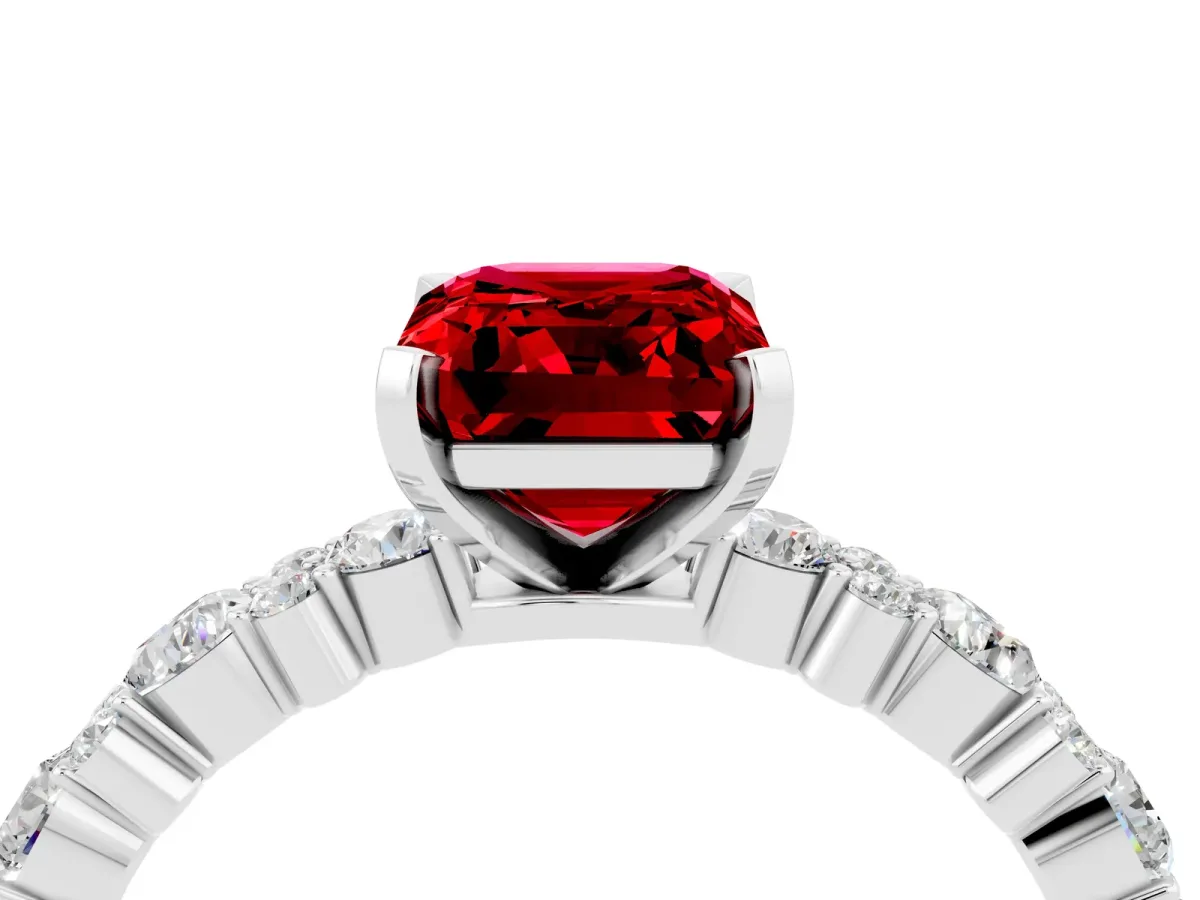 Emerald Cut Ruby Side Stone Solitaire Ring with Round and Four-Prong Setting Silver
