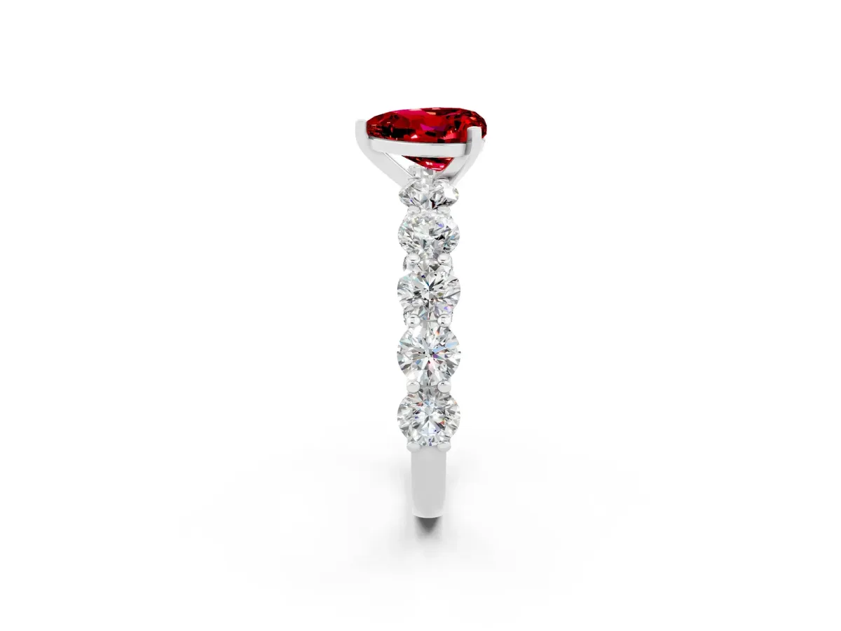 Heart Cut Ruby Prong Setting with Side Stones on a Pave Band Silver