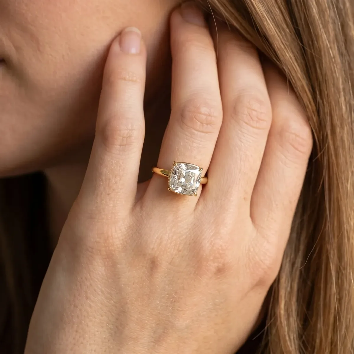 Old Mine Elongated Cushion Diamond East-West Bezel Set Four Claw Solitaire Ring Yellow gold