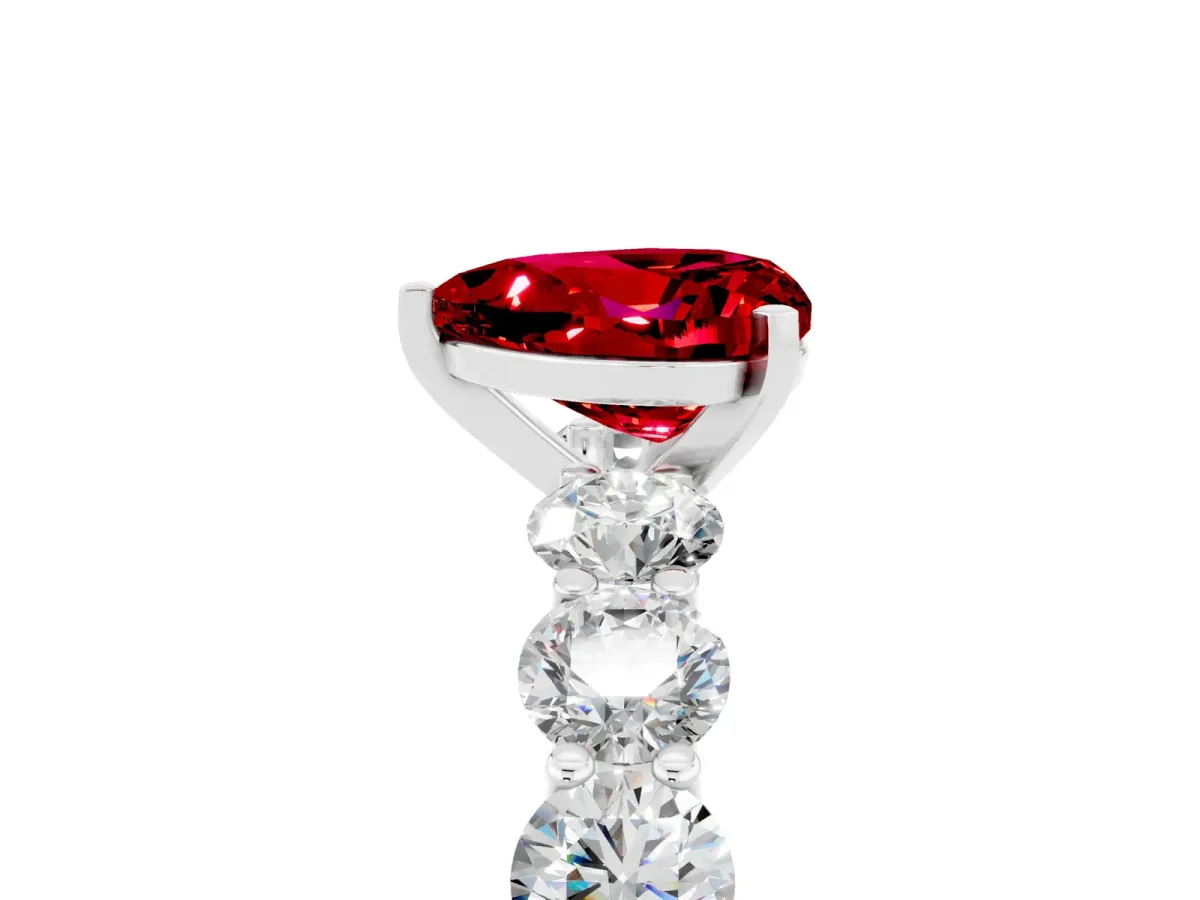 Heart Cut Ruby Prong Setting with Side Stones on a Pave Band Silver