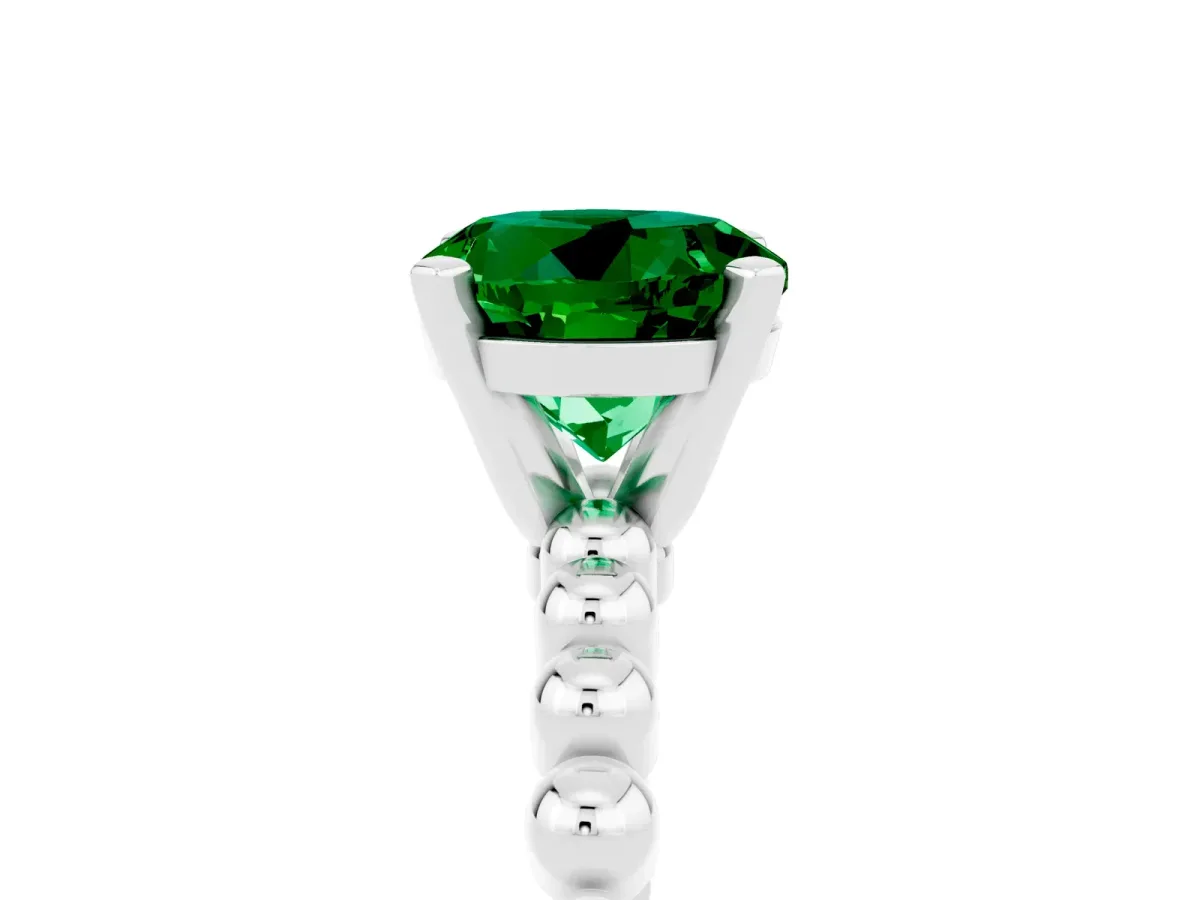 Round Cut Emerald Solitaire Ring with Beaded Band and Prong Setting Platinum