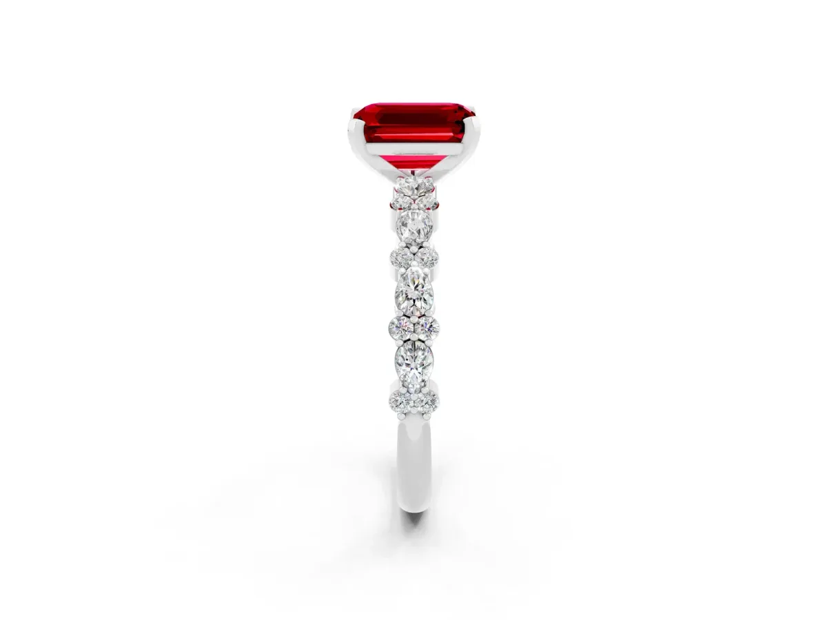 Emerald Cut Ruby Side Stone Solitaire Ring with Round and Four-Prong Setting Silver
