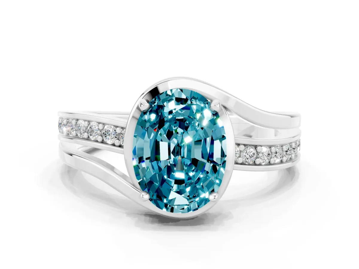 Oval Cut Blue Topaz Solitaire Ring with Split Shank and Prong Setting White gold