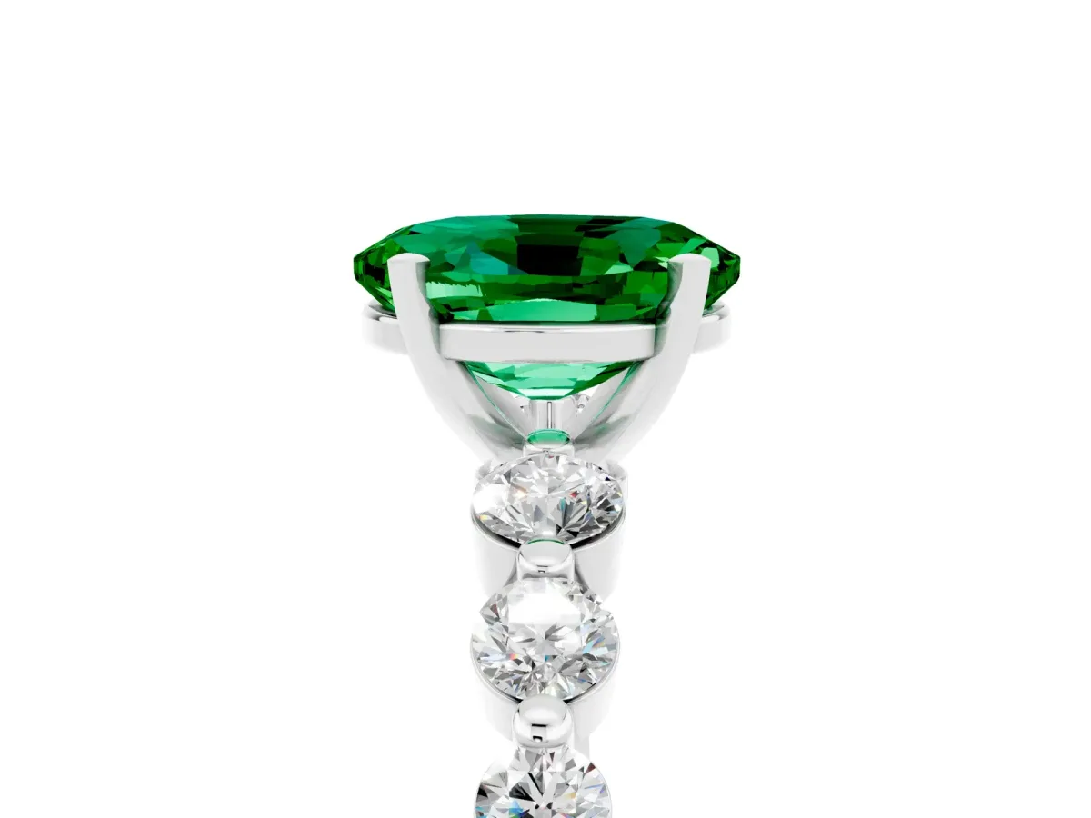 Oval Cut Solitaire Emerald Ring with Pave Band and Four-Prong Setting Platinum