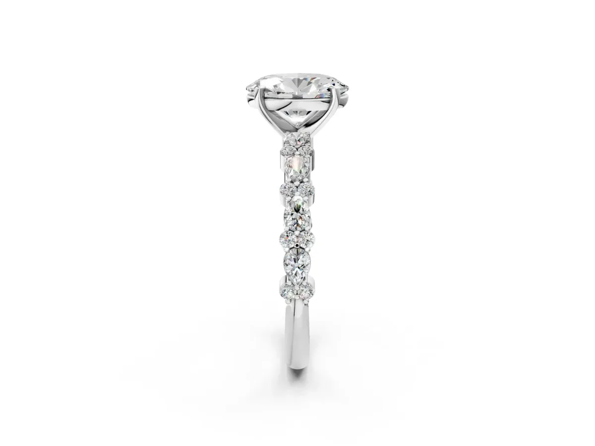 Oval Cut Diamond Side Stone Solitaire Ring with Round and Four-Prong Setting Silver