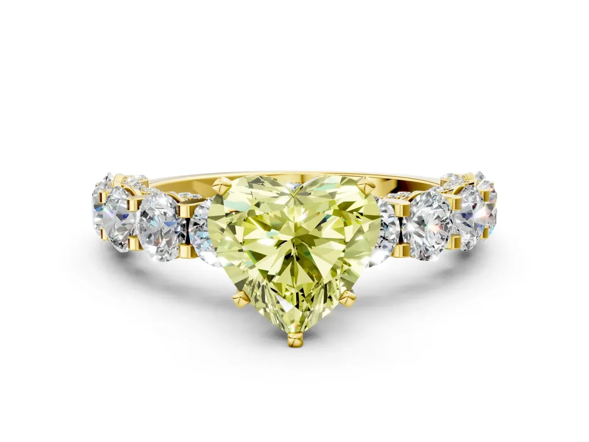 Fancy Yellow Heart Cut Diamond Side Stone Engagement Ring with Four-Prong Setting Yellow gold