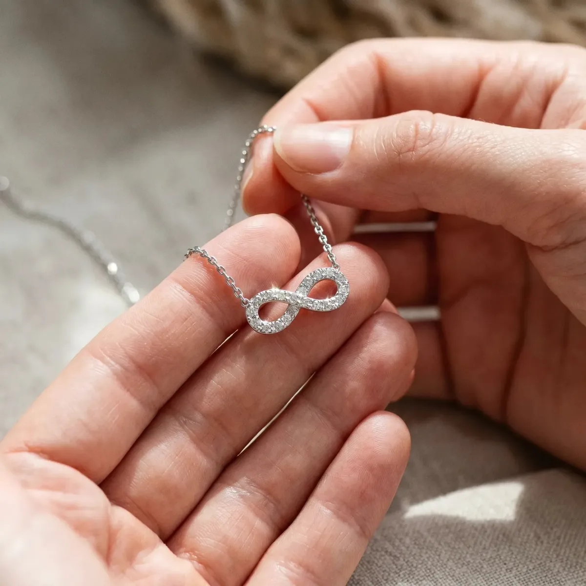 Infinity Pendant with Round Diamond Pavé Setting White gold
