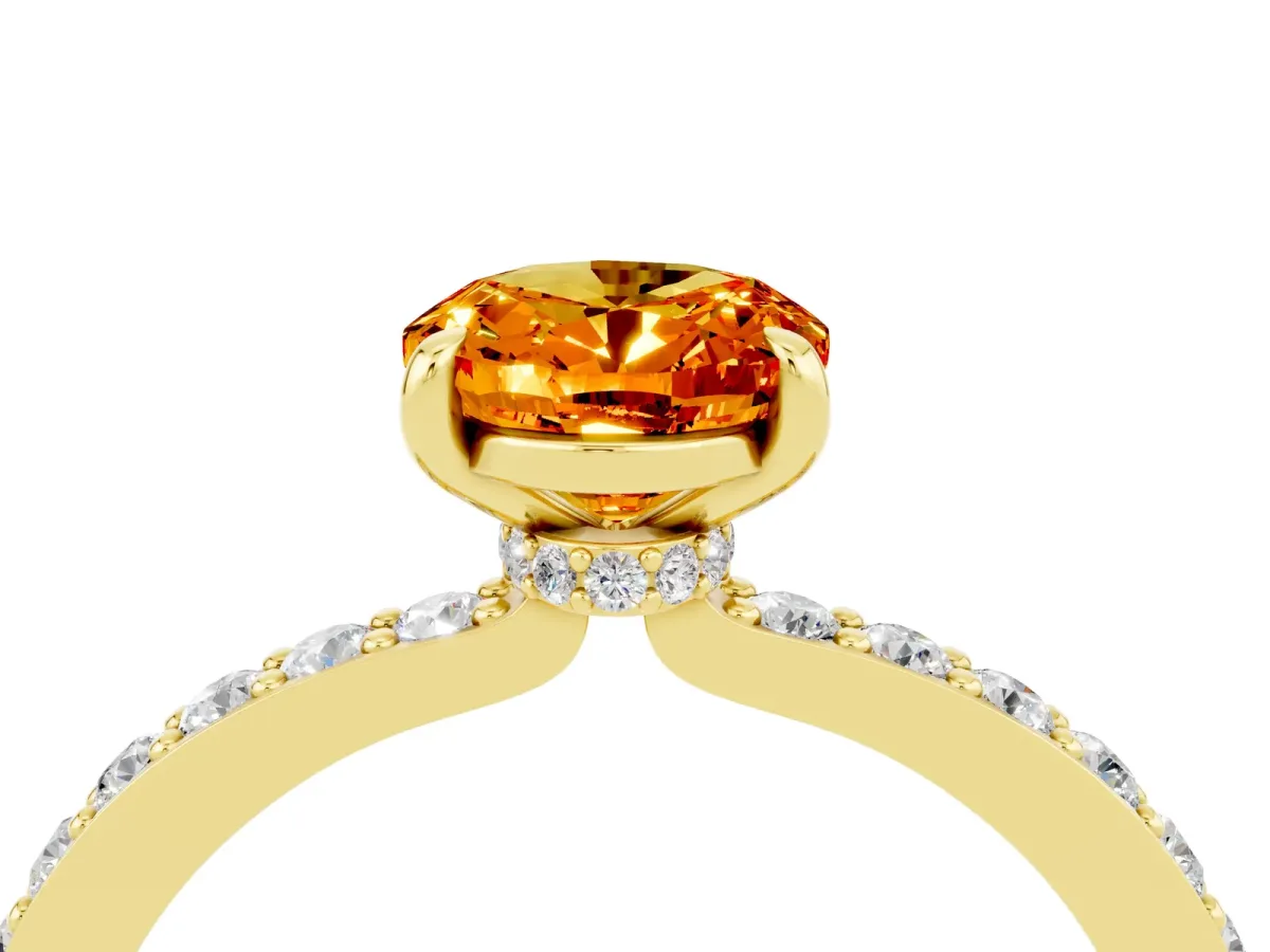 Oval Cut Citrine Solitaire Engagement Ring with Pavé Band and Four-Prong Setting Yellow gold
