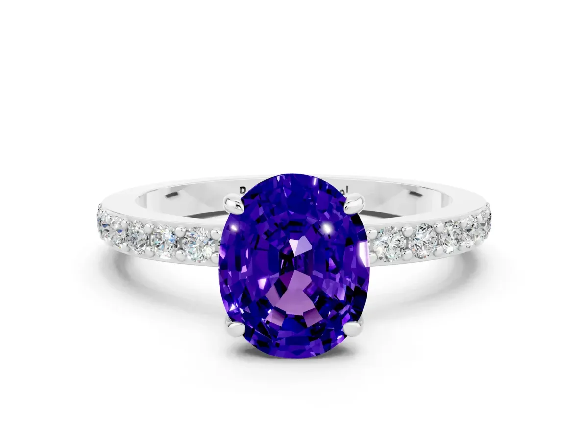 Oval Cut Tanzanite Solitaire Engagement Ring with Pavé Band and Four-Prong Setting Platinum