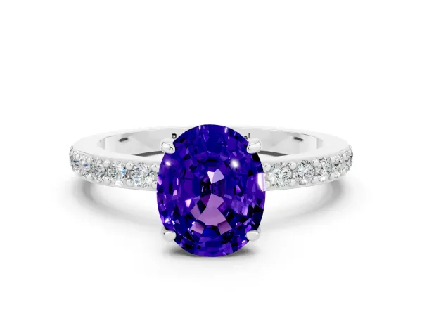 Oval Cut Tanzanite Solitaire Engagement Ring with Pavé Band and Four-Prong Setting Platinum