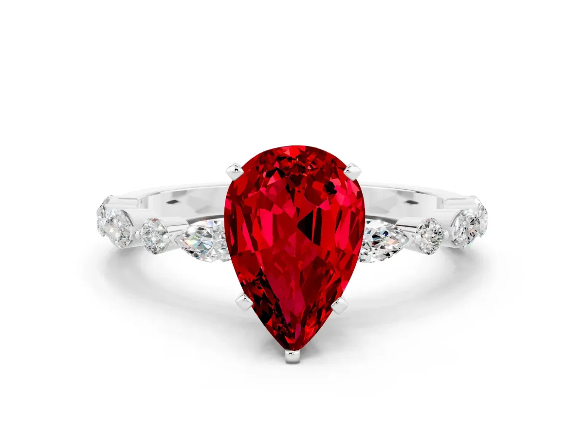 Pear Cut Ruby Ring with Marquise and Round Side Stones and Four-Prong Setting Platinum