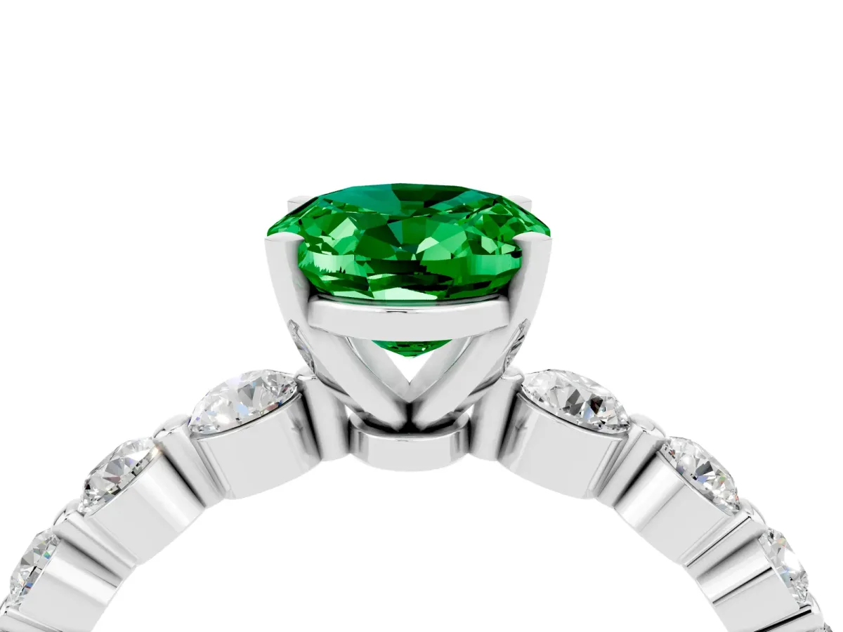 Oval Cut Solitaire Emerald Ring with Pave Band and Four-Prong Setting Platinum