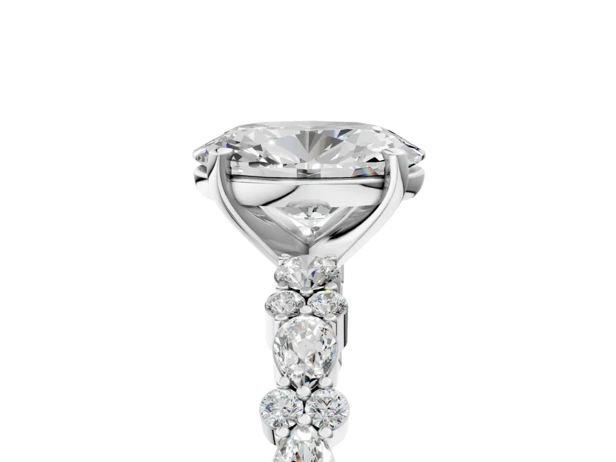Oval Cut Diamond Side Stone Solitaire Ring with Round and Four-Prong Setting Silver