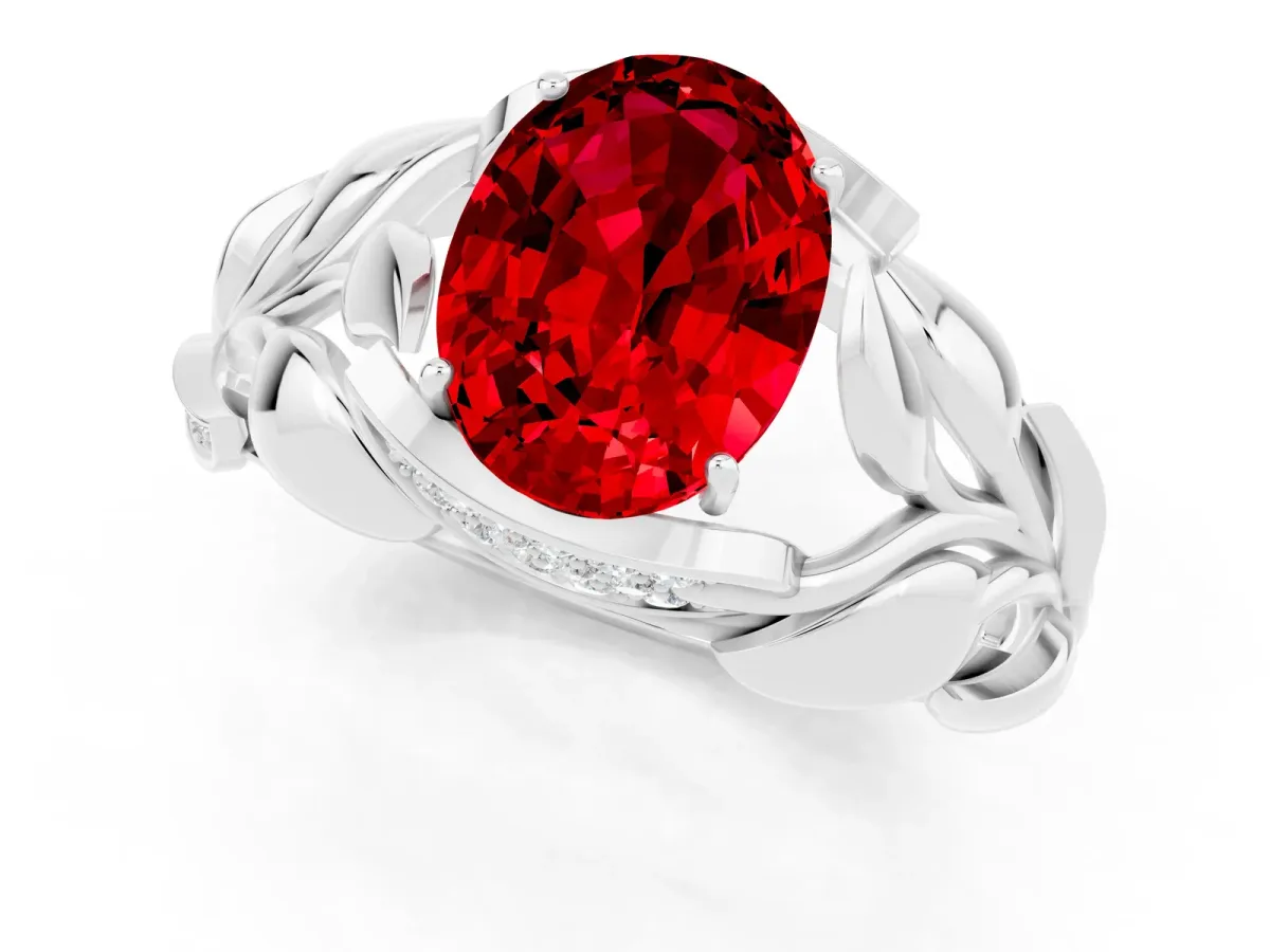 Oval Cut Ruby Leaf-Inspired Engagement Ring with Round Accents and Prong Setting Platinum