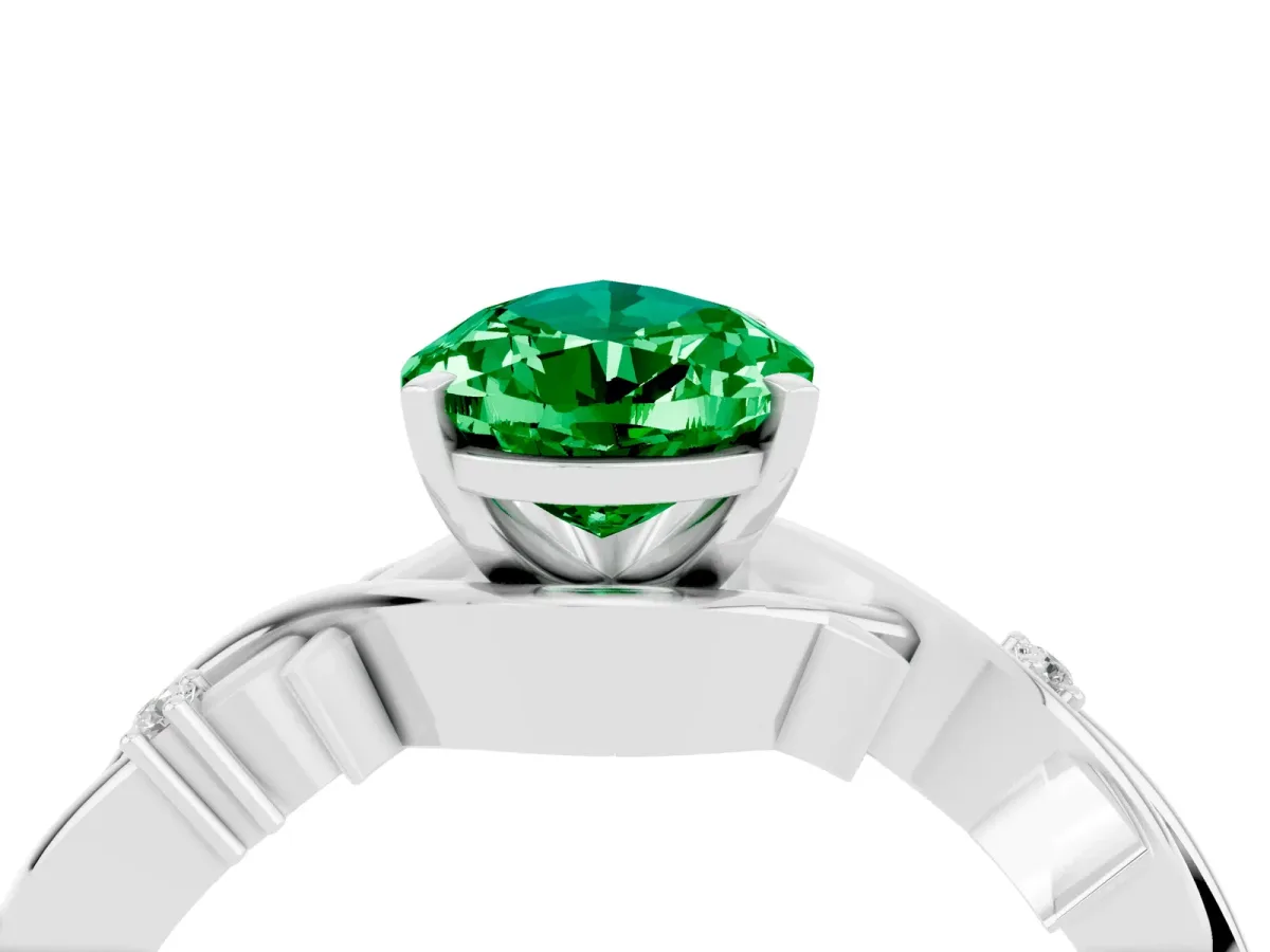 Pear Cut Emerald Solitaire Ring with Twisted Band and Prong Setting Platinum