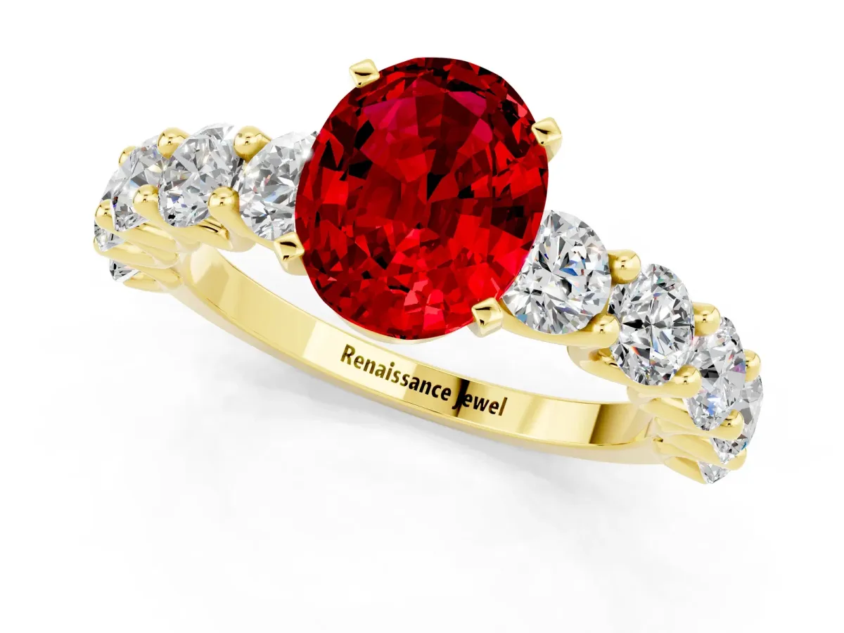 Oval Cut Ruby Prong Setting with Side Stones on a Pave Band Yellow gold