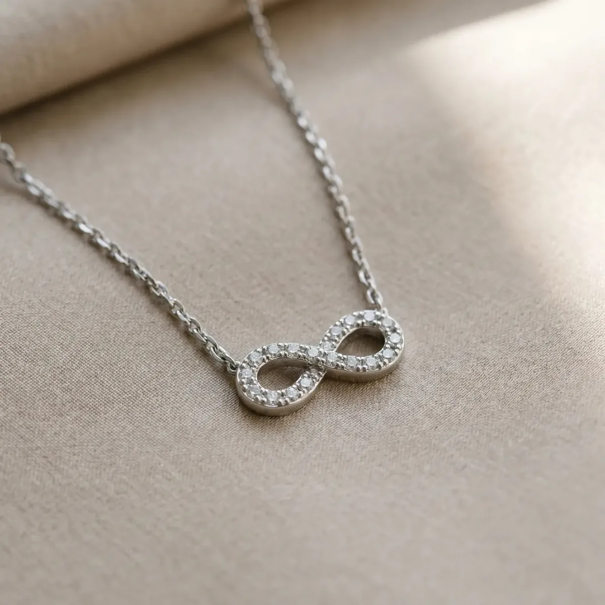 Infinity Pendant with Round Diamond Pavé Setting White gold