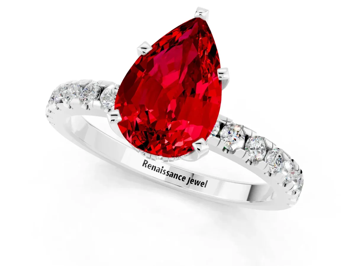 Pear Cut Ruby Solitaire Ring with Round Pavé Band and Four-Prong Setting White gold