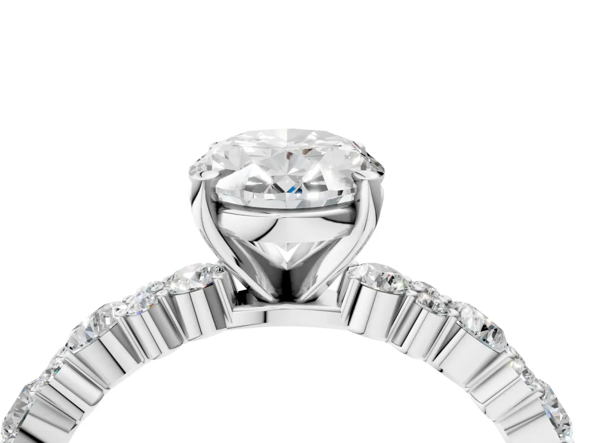 Oval Cut Diamond Side Stone Solitaire Ring with Round and Four-Prong Setting Silver