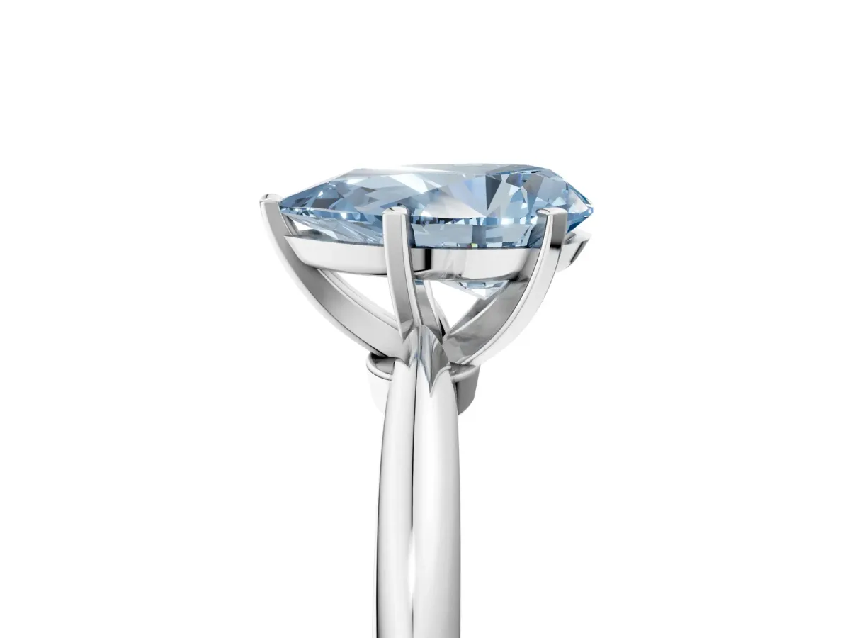 Fancy Blue Pear Cut Diamond Solitaire Ring with Six-Prong Setting and Classic Band Silver
