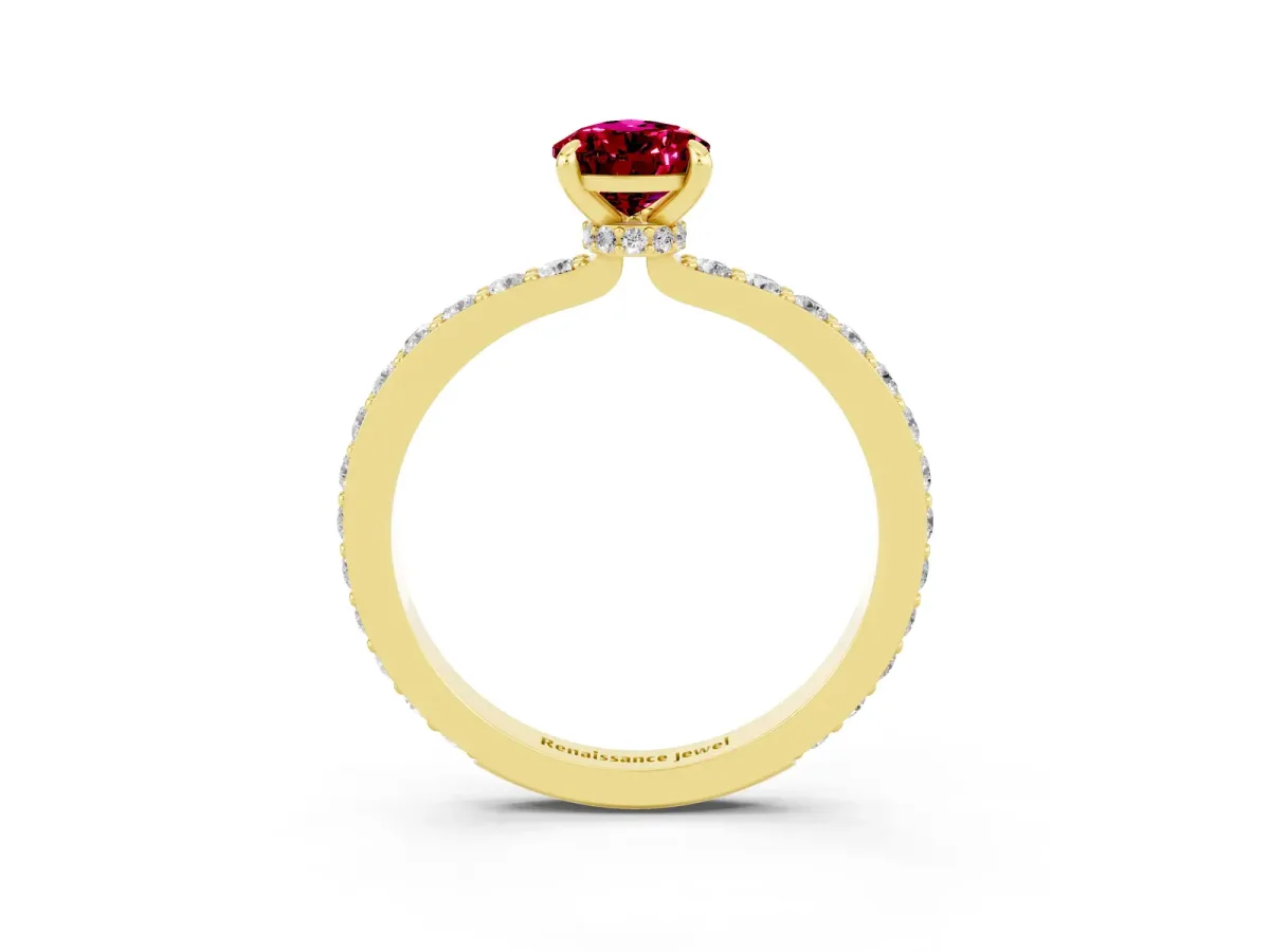 Pear Cut Garnet Solitaire Engagement Ring with Pavé Band and Four-Prong Setting Yellow gold