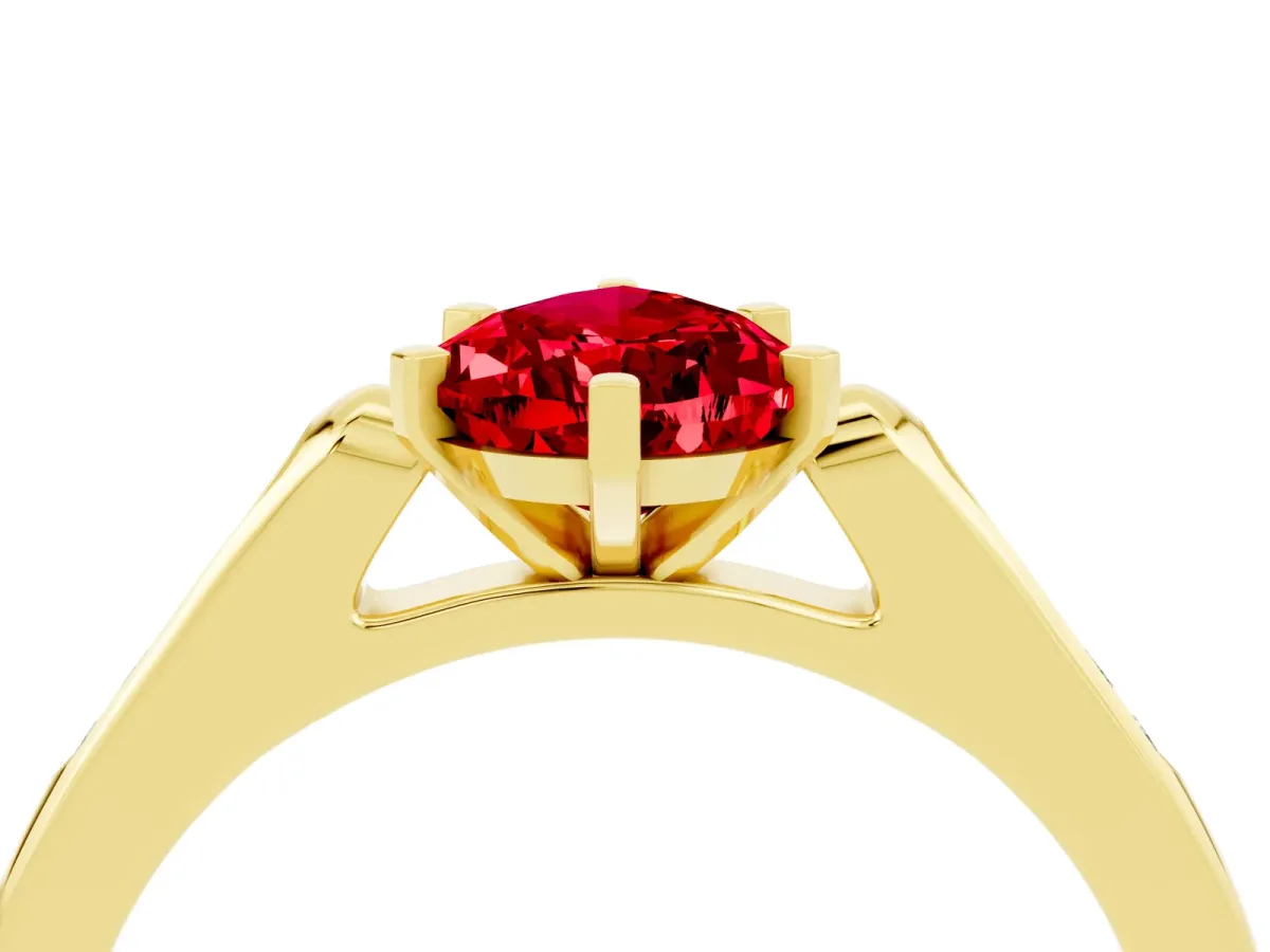 Pear Cut Ruby Solitaire Ring with Channel Set Round Band and Prong Setting Yellow gold