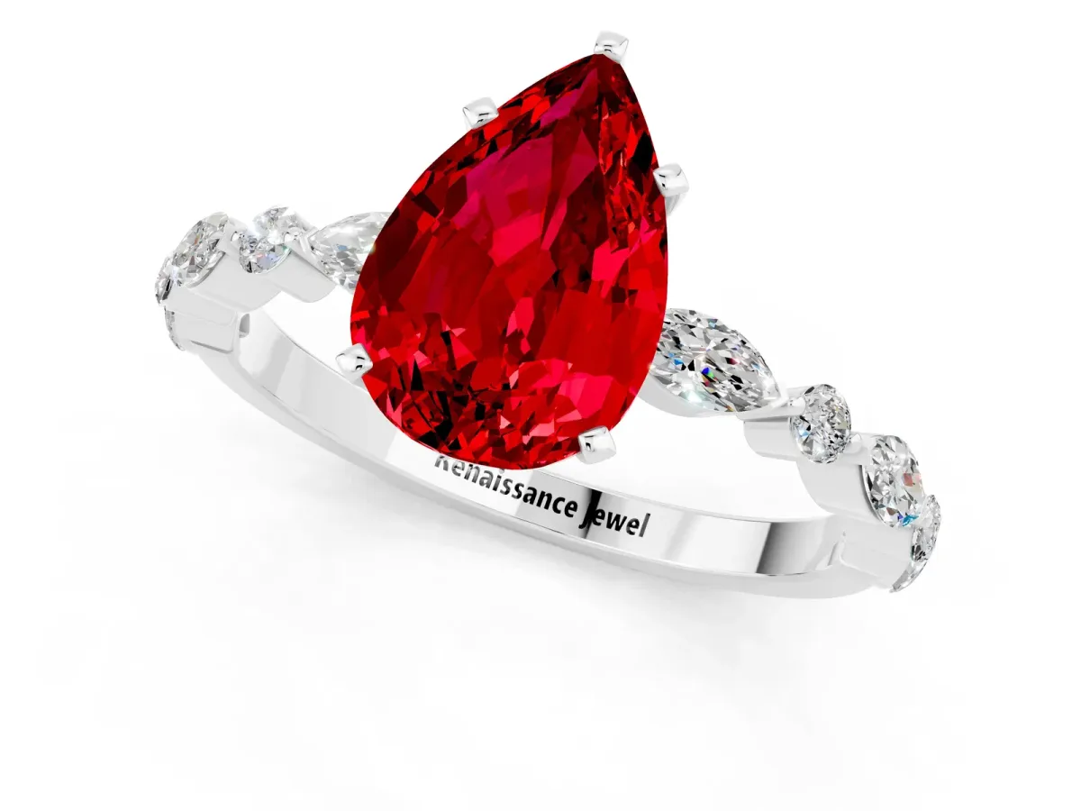 Pear Cut Ruby Ring with Marquise and Round Side Stones and Four-Prong Setting Platinum