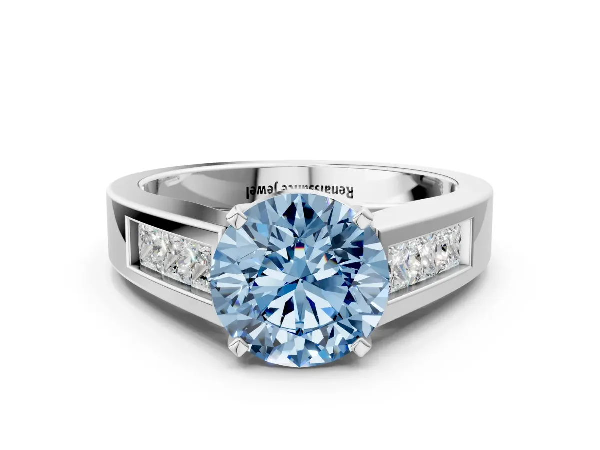 Fancy Blue Round Cut Cut Channel Set Solitaire Ring with Four-Prong Setting Silver