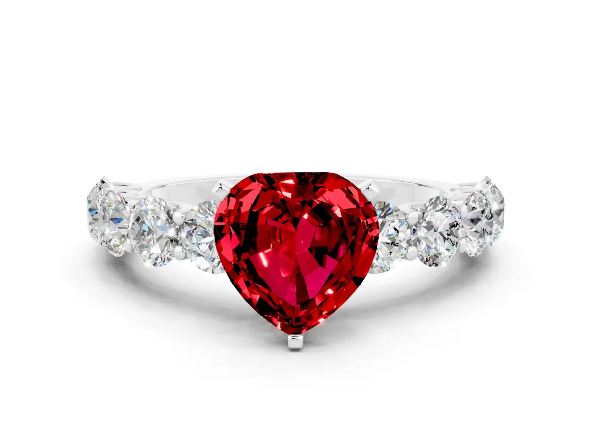 Heart Cut Ruby Prong Setting with Side Stones on a Pave Band Silver