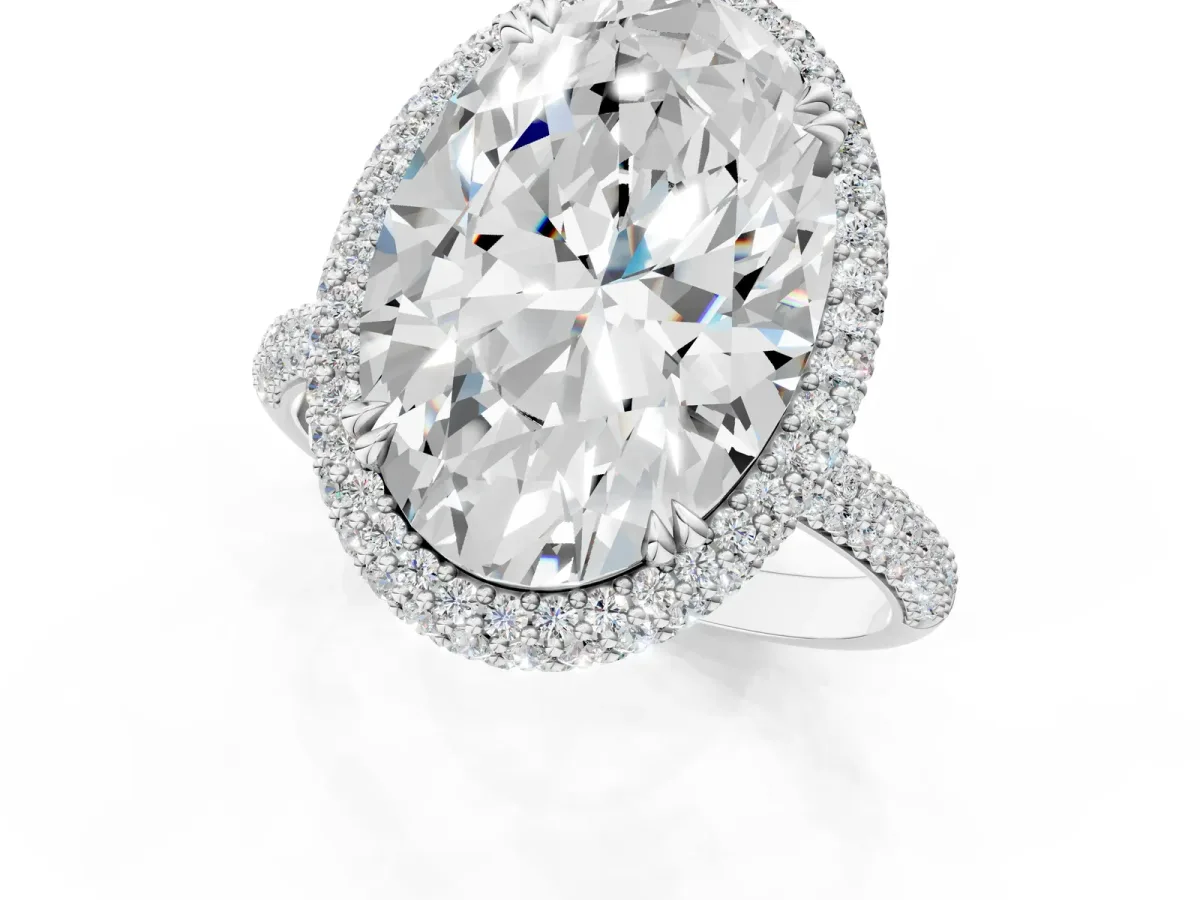 Oval Diamond Halo Ring with Round Diamond Accents Platinum